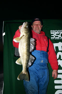 Danny Erickson of Stanchfield, Minnesota went shallow on deep structure to catch this nice mid winter walleye.